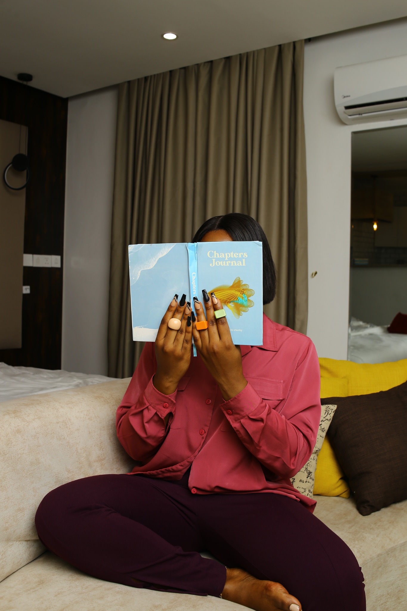 Participant holding a CHAPTERS Journal.